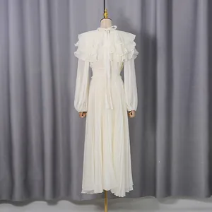 Elegant cream pleated chiffon maxi dress back view with ruffles and lantern sleeves