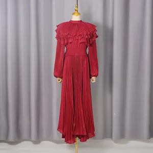 Elegant red pleated chiffon maxi dress with ruffled collar and lantern sleeves on mannequin