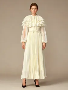 Elegant cream Victorian-style pleated maxi dress with lantern sleeves and tiered ruffles