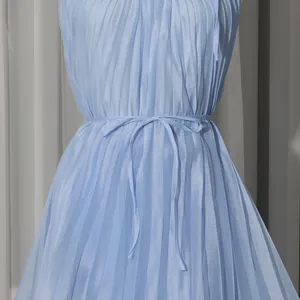 Detailed view of light blue sleeveless pleated tulle dress with slim waist tie belt