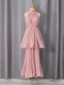 Pink halter sleeveless pleated chiffon dress with tiered skirt for summer resort style