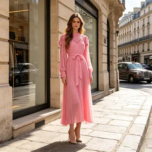Elegant pink long-sleeved pleated chiffon maxi dress with lace detailing and bow belt