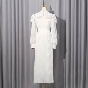 Back view of an elegant white chiffon maxi dress with lace detailing and pleated skirt