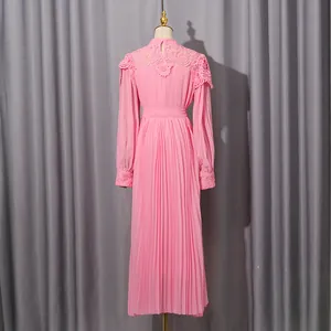 Back view of pink pleated chiffon maxi dress with elegant lace collar and long sleeves.