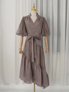 French style lace maxi dress with V-neck puff sleeves and tie waist in elegant purple-taupe.