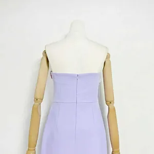 Detailed back view of a lavender strapless dress with a sleek invisible zipper closure