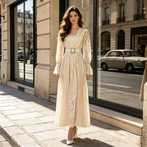 Full-body shot of an elegant vintage cream lace long dress with a cinched waist belt
