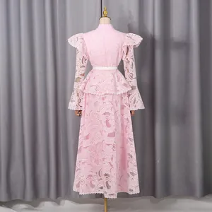 Elegant pink lace embroidered maxi dress featuring ruffled details and flared sleeves, back view