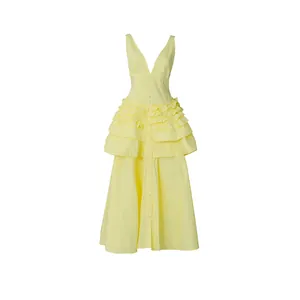 Front view of an elegant yellow tiered ruffle midi dress with deep V-neck and buttons