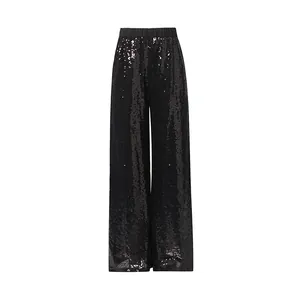 Vista detallada de elegantes pantalones de pierna ancha con lentejuelas negras para mujer