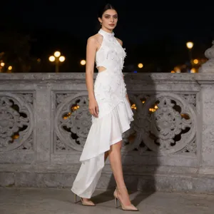 Elegant white sleeveless resort dress featuring waist cutouts and high-low asymmetrical hem.