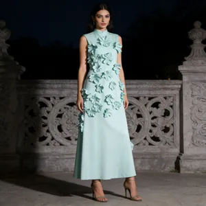 Elegant mint green sleeveless long dress with 3D floral appliqués in a night garden.