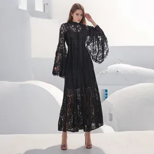 Elegant black lace maxi dress featuring flared sleeves and French embroidery detail