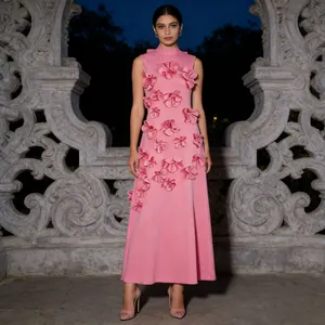 Detailed view of pink French style sleeveless maxi dress with 3D floral appliqués