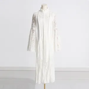 Full view of white French style lace dress with elegant flare sleeves and embroidery