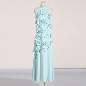 Elegant sleeveless light blue maxi dress featuring detailed 3D floral appliqués.