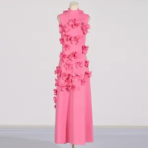 Elegant pink sleeveless maxi dress featuring intricate 3D floral appliqués and high neck.