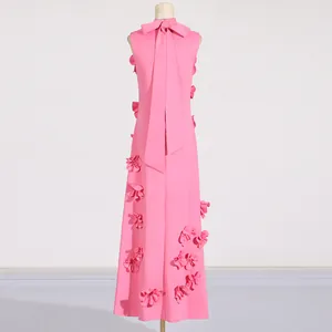 Elegant pink sleeveless maxi dress back view featuring 3D floral appliques and a long bow tie