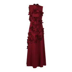 Detailed view of burgundy French-style sleeveless long dress with 3D floral appliqués