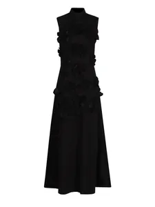 Sophisticated black sleeveless maxi dress with elegant 3D floral appliqué detail.