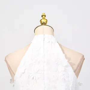 Detailed view of white floral lace fabric on elegant high-neck sleeveless summer dress