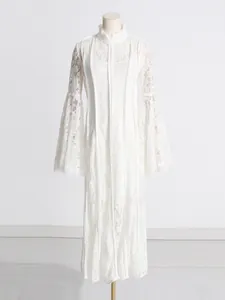 Elegant French style white lace maxi dress featuring intricate heavy embroidery design