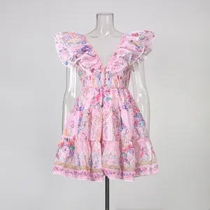Sweet pink floral tiered mini dress with ruffle sleeves and V-neckline for summer