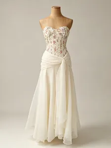 Elegant French floral corset maxi dress with ivory chiffon skirt and draped waist
