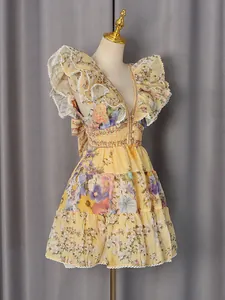 Sweet floral ruffled V-neck mini dress for summer resort style and vacation wear.