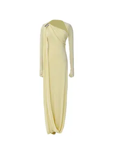 Elegant one-shoulder maxi dress in pale yellow with draped detail and silver clasp