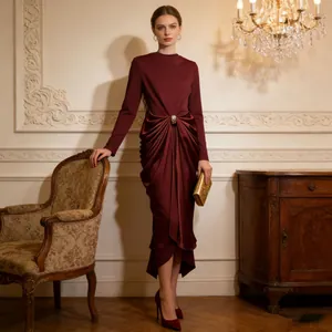 Elegant burgundy long-sleeve evening dress with waist draping and slim fit design