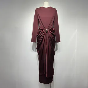 Front view of elegant burgundy maxi dress featuring a pleated waist with a jeweled buckle