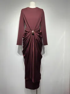 Elegant burgundy long-sleeved bodycon maxi dress with stylish ruched waist detail.