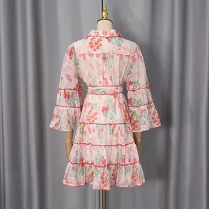 Back view of pink cherry print French style tiered shirt dress for women