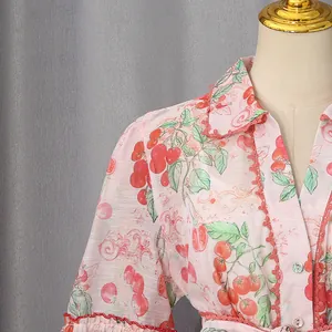 Detailed macro view of French sweet style cherry print summer shirt dress fabric texture
