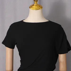 Detailed view of the black ribbed fabric texture on this stylish slim fit dress