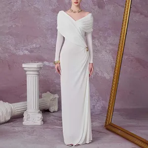 Elegant white long sleeve maxi dress with pleated waist detail and slim fit design