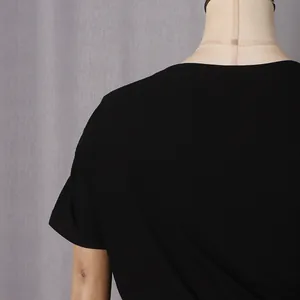 Detailed close-up showing the high-quality black ribbed knit fabric of a sexy waistless dress