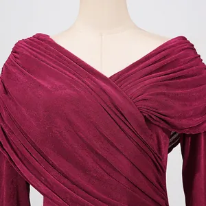 Close-up of burgundy pleated cross neckline detail on a slim-fit long-sleeved dress.
