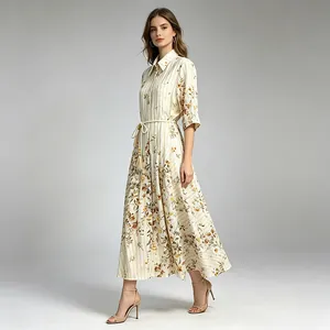 Full-length view of an elegant French-style floral maxi dress with a waist tie detail