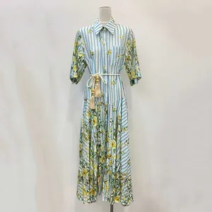 Elegant French style floral striped summer long dress with tassel waist tie on mannequin