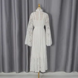Detailed back view of an elegant white lace maxi dress with flared bell sleeves.