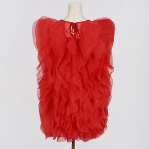 Back view detail of a vibrant red ruffled tulle sleeveless mini dress on mannequin.