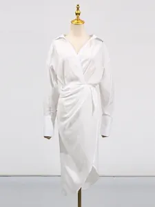 Elegant white V-neck long sleeve midi dress with high waist and asymmetrical slit hem