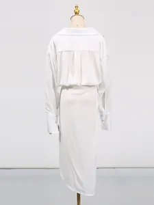 Elegant white V-neck long sleeve dress with high waist and irregular slit hem