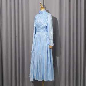 Side view of light blue shimmering pleated maxi dress on mannequin