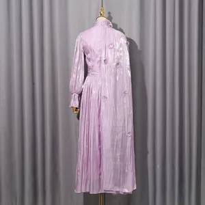 Elegant lavender pleated maxi dress featuring 3D floral accents for a French look