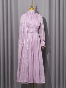 Elegant lavender pleated maxi dress with high neck and 3D floral details for spring.