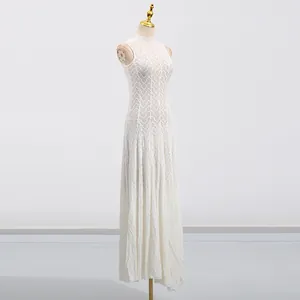 Elegant French style white lace hollowed-out sleeveless maxi dress shown on mannequin