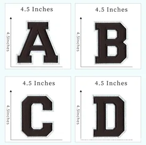 Detailed view of 4.5 inch black and white varsity letter patches A B C and D for DIY